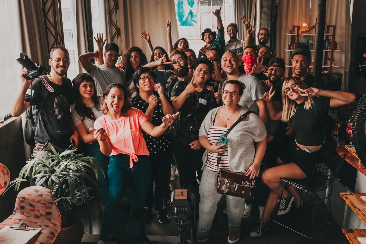 The Art of Drawing Readers In: Your attractive post title goes here Diverse group enjoying a cheerful meeting indoors in São Paulo, capturing unity and joy.